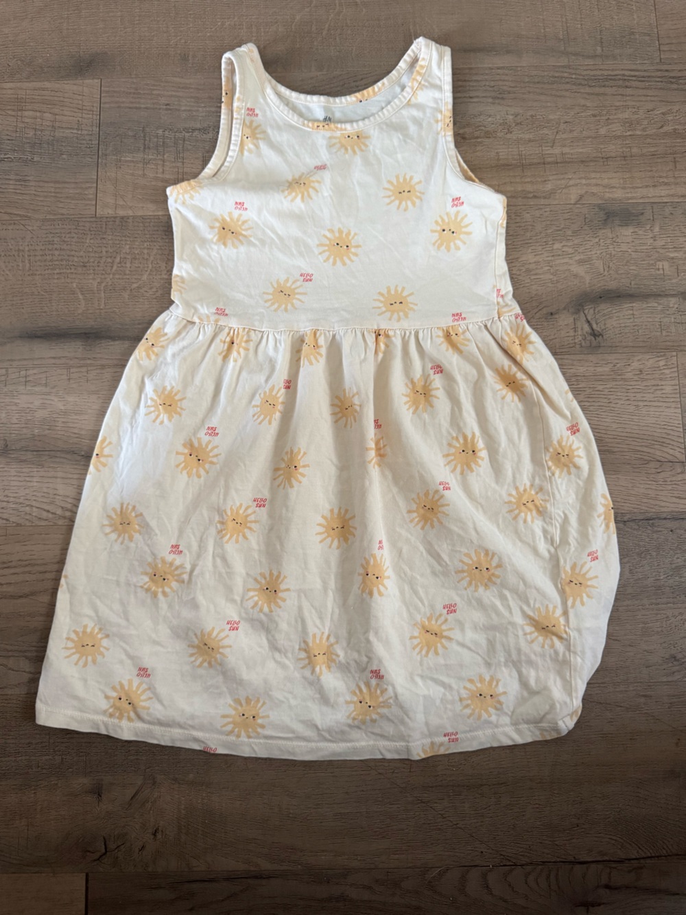 H&M light yellow/cream Dress with Yellow Suns for kids size 8 to 10